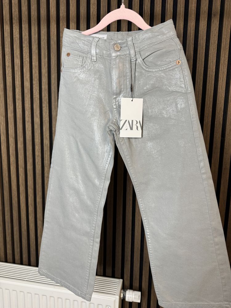 Nowe błyszczące jeansy zara 122