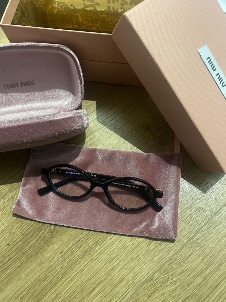 Okulary miu miu zerowki model MIU MIU MU 04ZS VAU08N 50