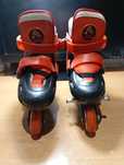Patins em linha vermelho