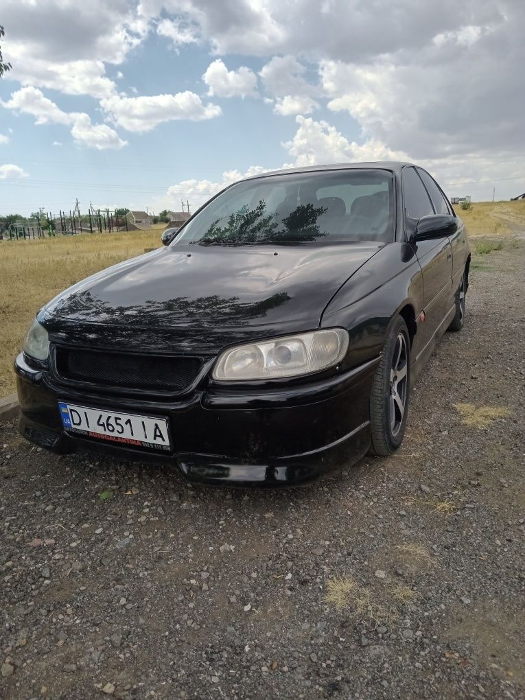 Опель омега б автомат