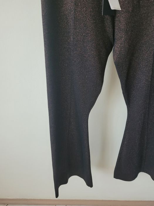 Brązowe czarne spodnie dzwony na imprezę święta