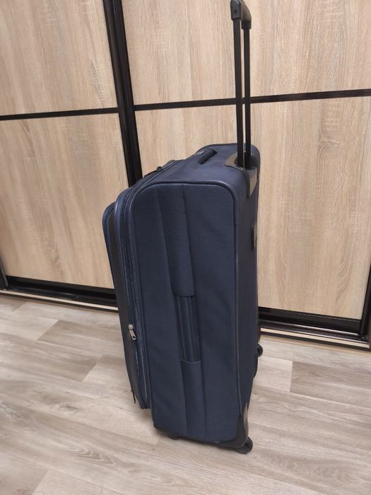 Чемодан бошьшого размера на колесах, валіза для подорожей тканина