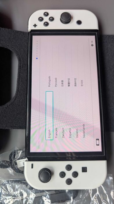 Nintendo Switch OLED 64GB + etui + szkło ochronne, pełny zestaw