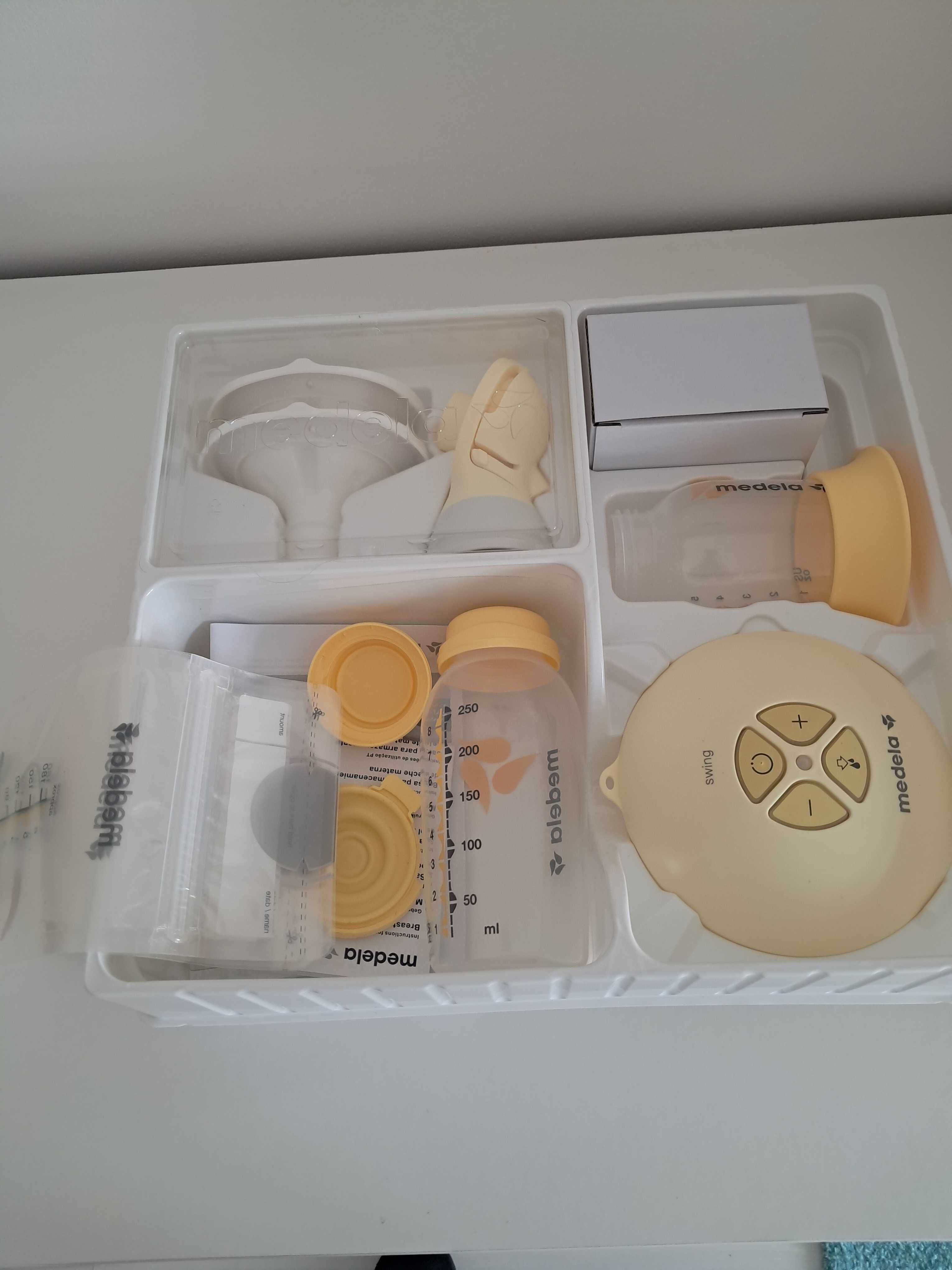 Bomba extratora de leite SWING FLEX da MEDELA como NOVA