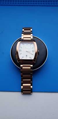 часы Kenneth Cole New York и женские часы Delta Burke