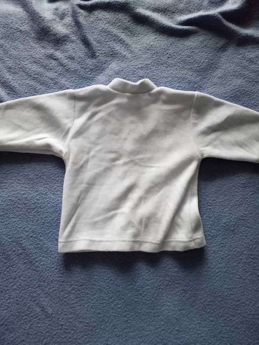 Niebieski welurowy kaftanik dla dziewczynki rozmiar 68