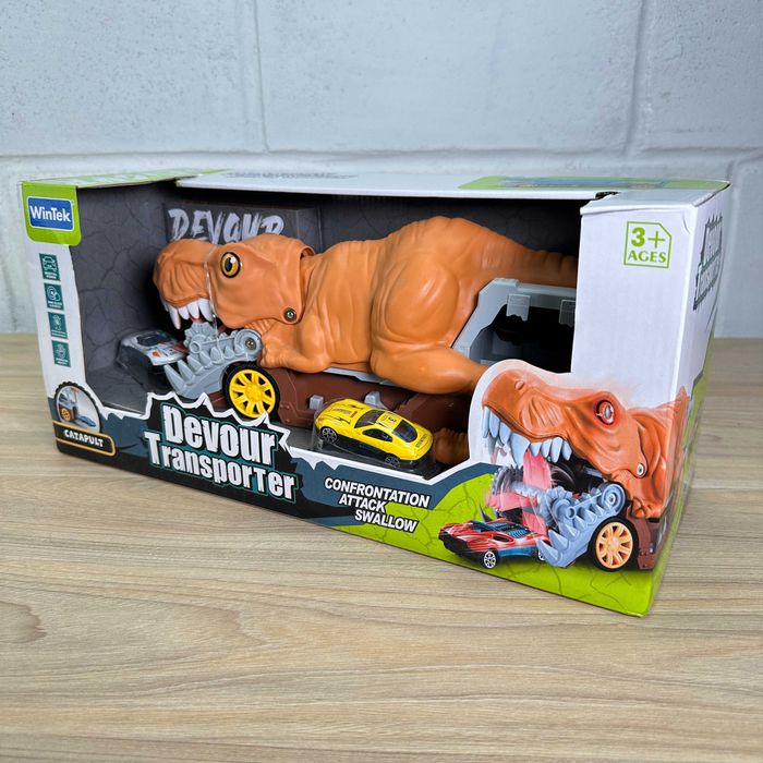 Трейлер-гараж з машинками у вигляді Динозавра E7018