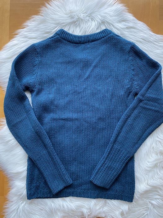 Sweter damski niebieski z warkoczem