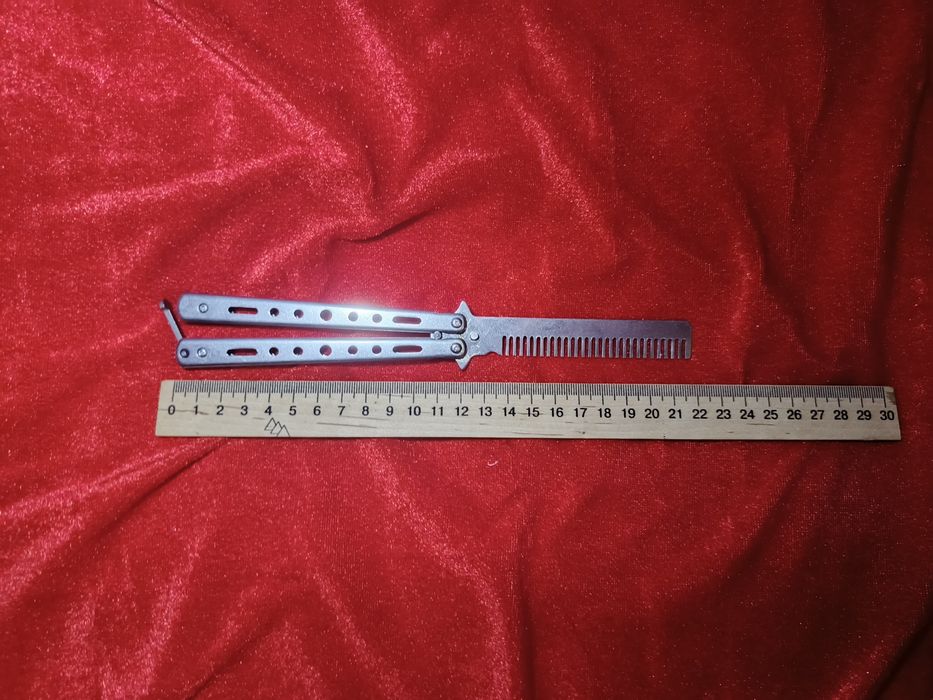 Гребінець метелик металічний