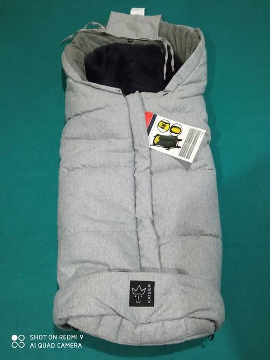 Kaiser śpiworek na nogi "Sheepy", kolor czarny wełna skora jagniecia