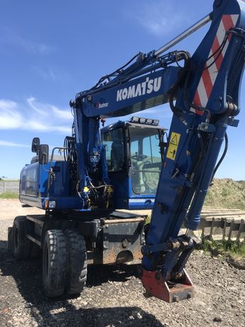 Koparka kołowa komatsu pw 180 cat jcb case atlas