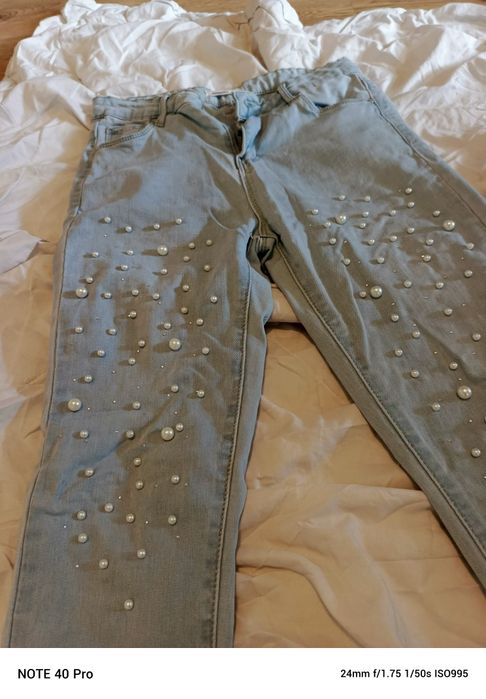 Spodnie jeansowe perełki 38