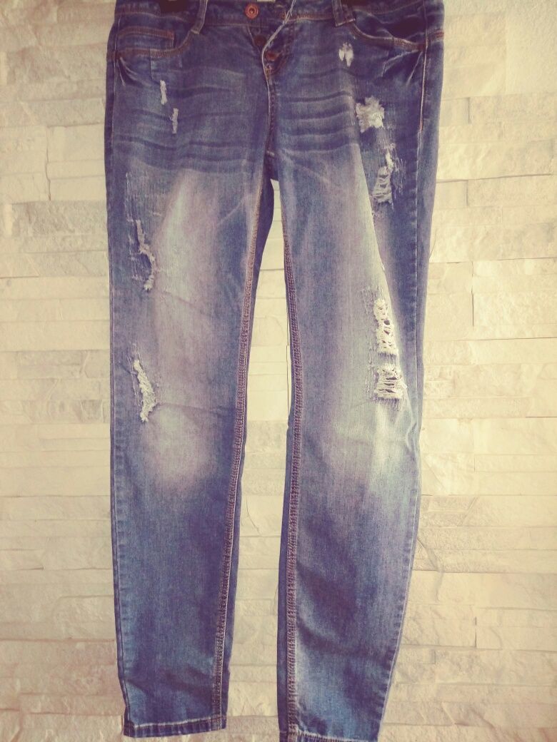 Spodnie jeans dziury przetarcia r 42/L/XL