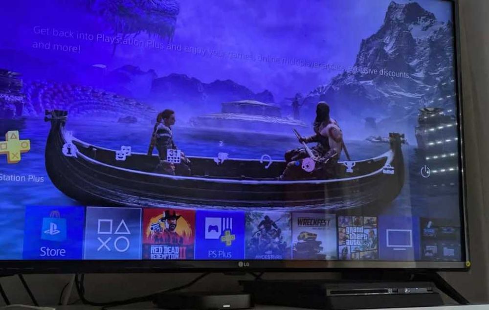 PlayStation 4 1TB em caixa + 1 Comando + Carregador de Comandos