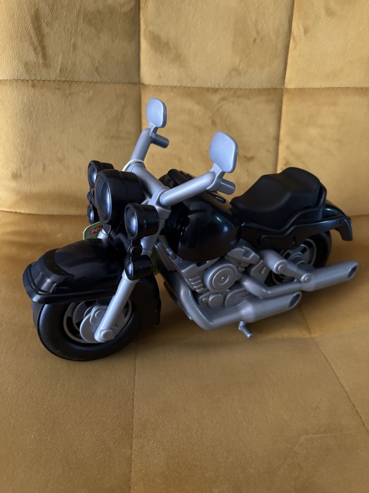 Plastikowy motor zabawka