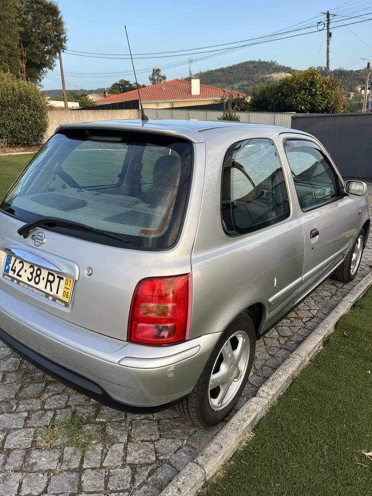 Nissan micra com AC, poucos KM