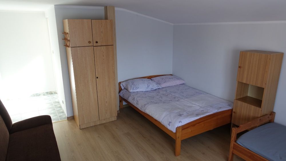 Rowy Apartamenty i pokoje gościnne Pod Dębem