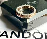 Pandora pierścionek pace z logo dwutonowy  cyrkonie złoto rose gold925