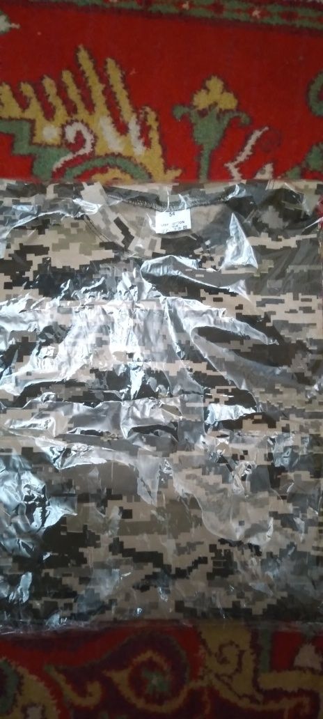 Продаю новую летнию футболку.(54 размер)Цена договорная