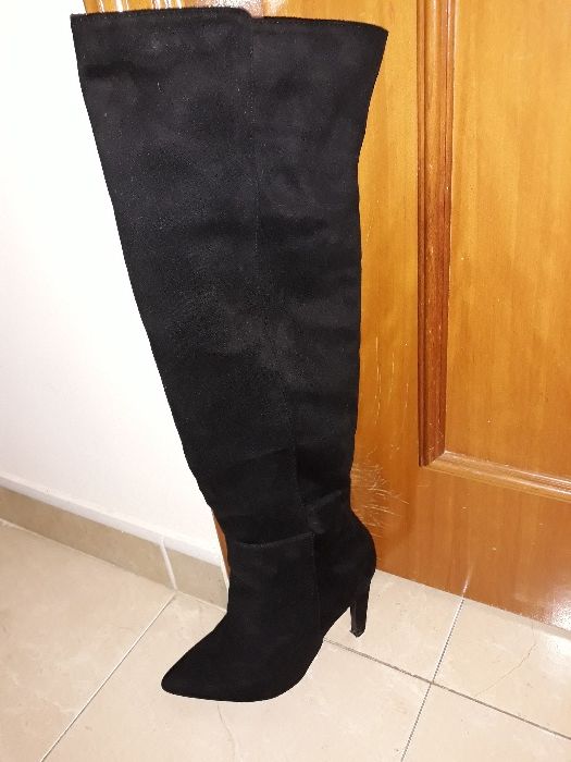 Botas de salto alto