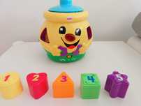 Garnuszek na klocuszek Fisher Price