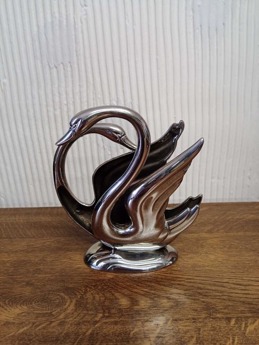 Serwetnik metalowy srebrny łabędzie