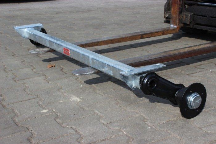 Прицеп торсионная ось балка подвеска