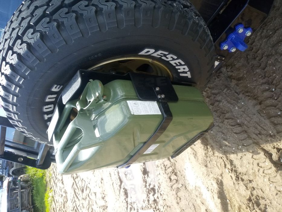 Mocowanie uchwyt kanistra paliwa zmota bulwarówka wyprawówka off road