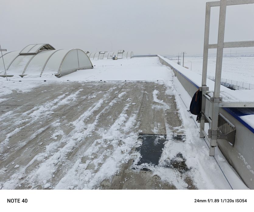 Odśnieżanie  dachów, parkingów