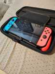 Nintendo switch oled + neogrip skull & co + etui