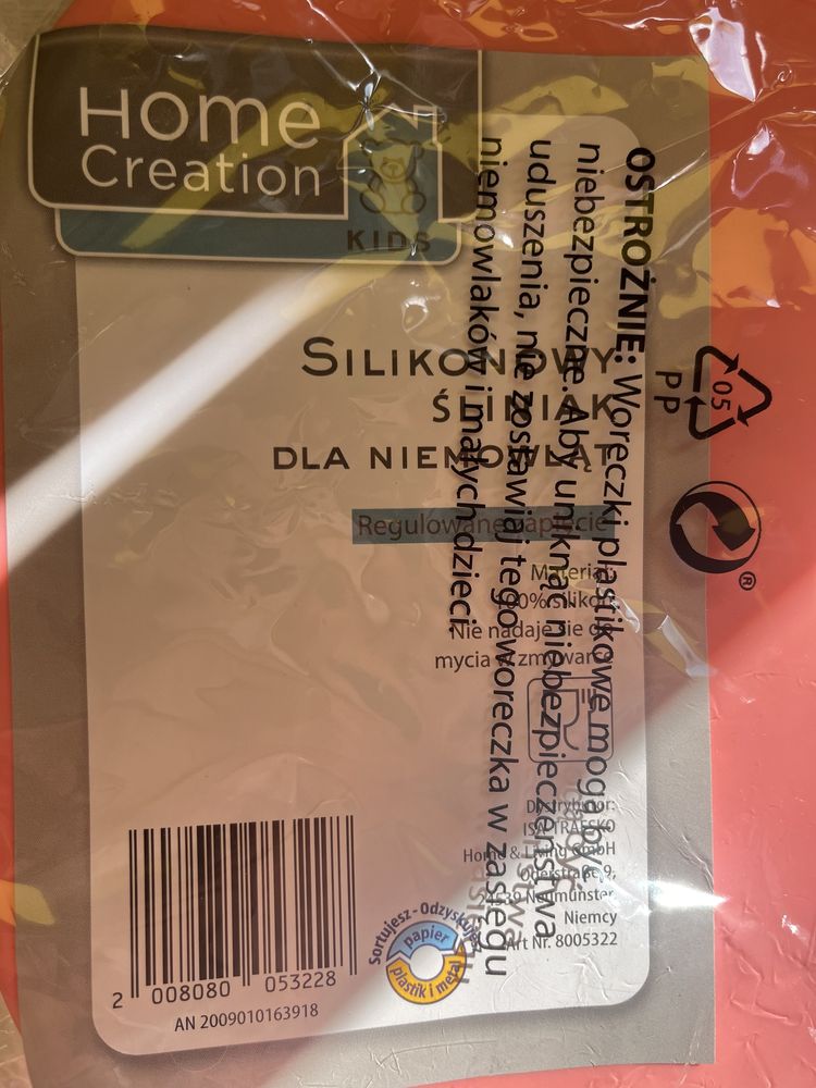 Silikonowy różowy śliniak tygrysek