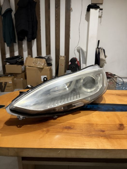 Фара ліва передня модел с 14 рік