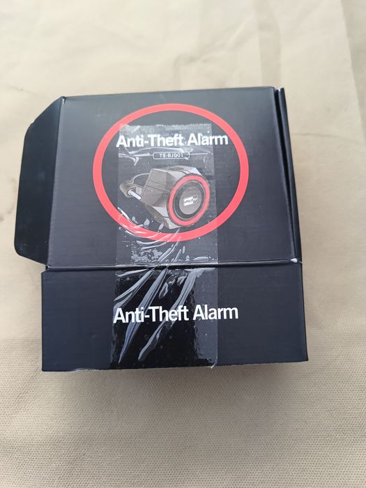 Alarm rowerowy na pilota lampka tylnia 2w1