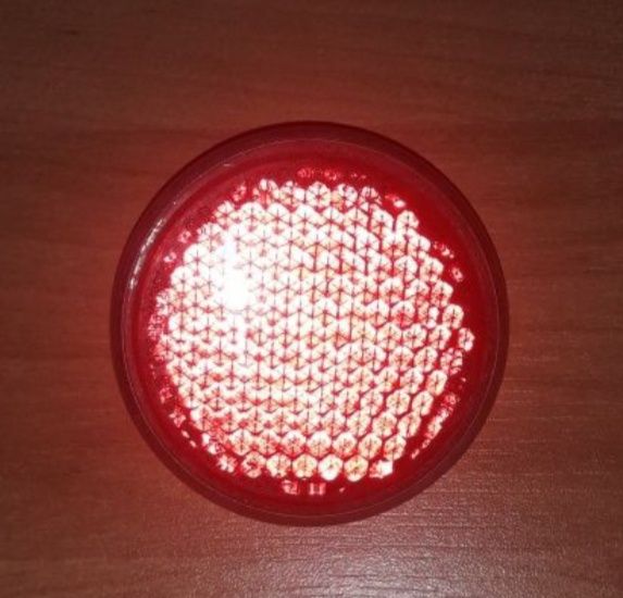 PRL odblask Ukraina stary czerwony 60 mm  dobry stan