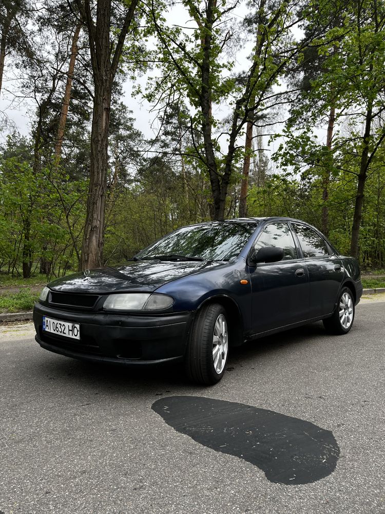 Mazda 323 1997 сел уехал