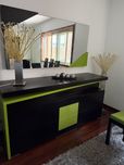 Aparador com detalhes verde