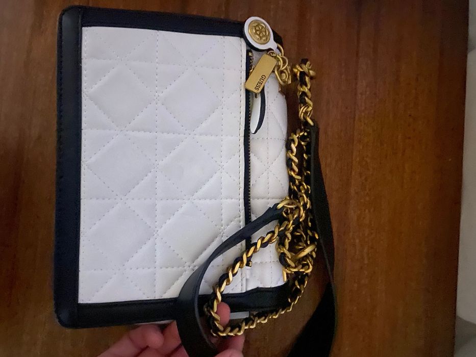 Mala guess pouco usada