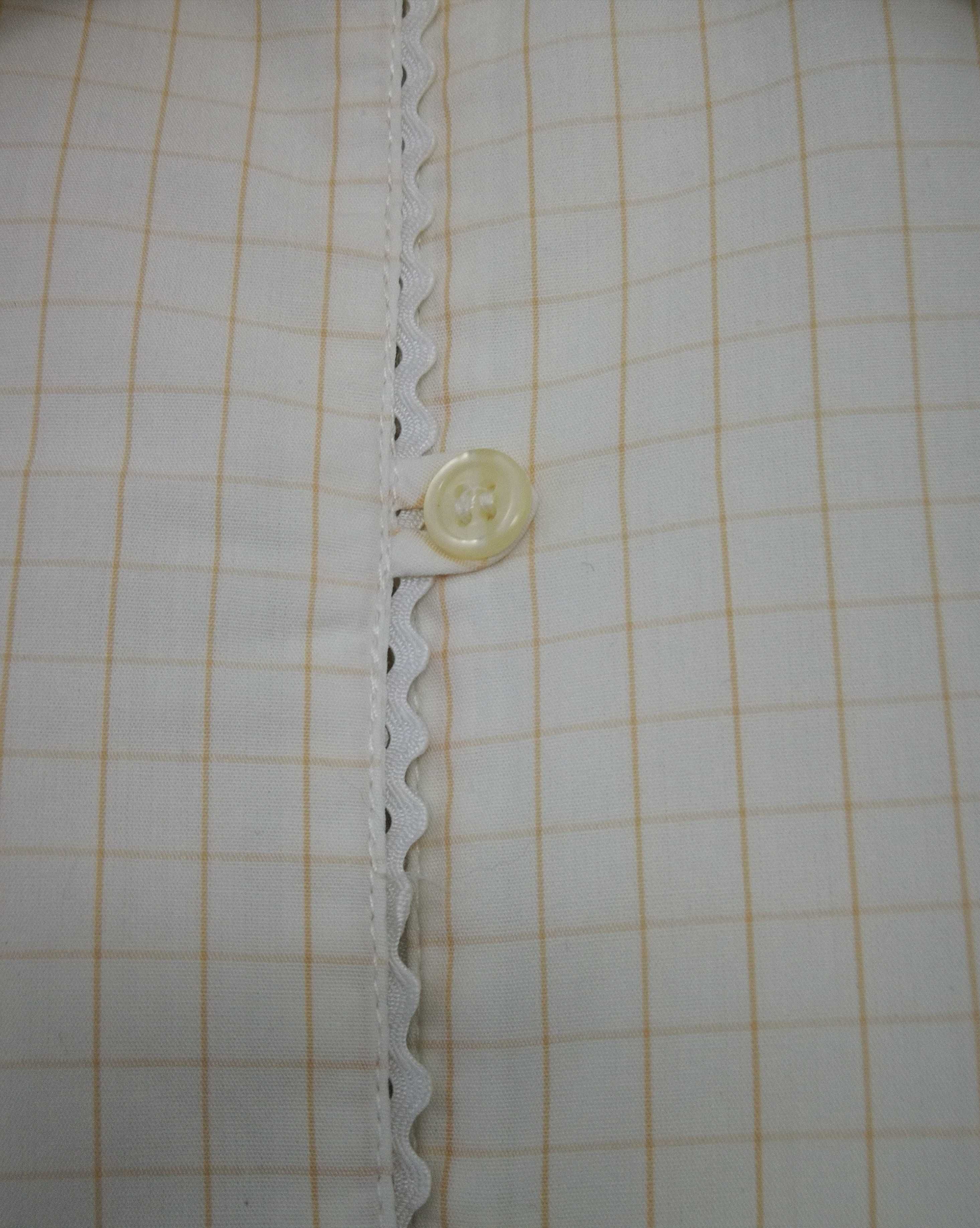 Lindíssima blusa em algodão com pormenores.