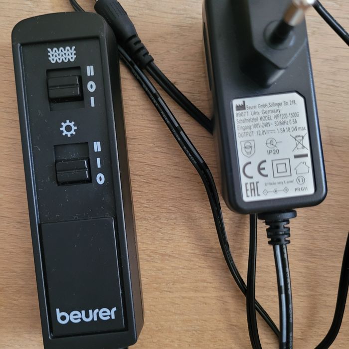 But rozgrzewający z masażerem stóp BEURER