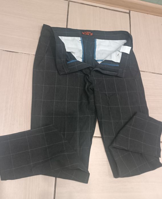 Класичні штани в клітинку