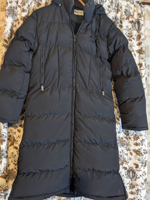 Пуховик длинный .