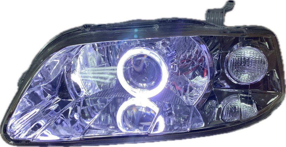 Новые фары с линзами Chevrolet Aveo T200 (шевроле авео). Тюнинг