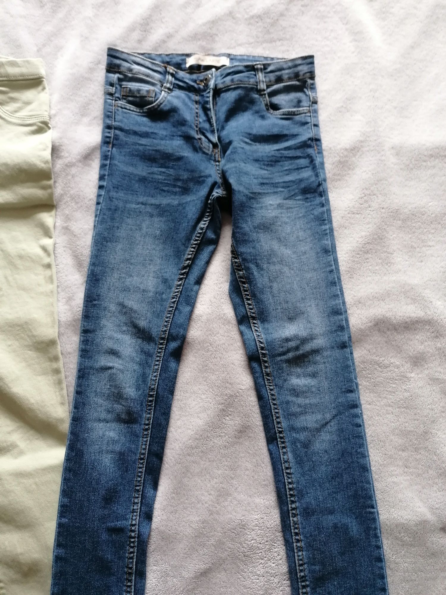 2x spodnie jeansowe dziewczęce rozm. 152