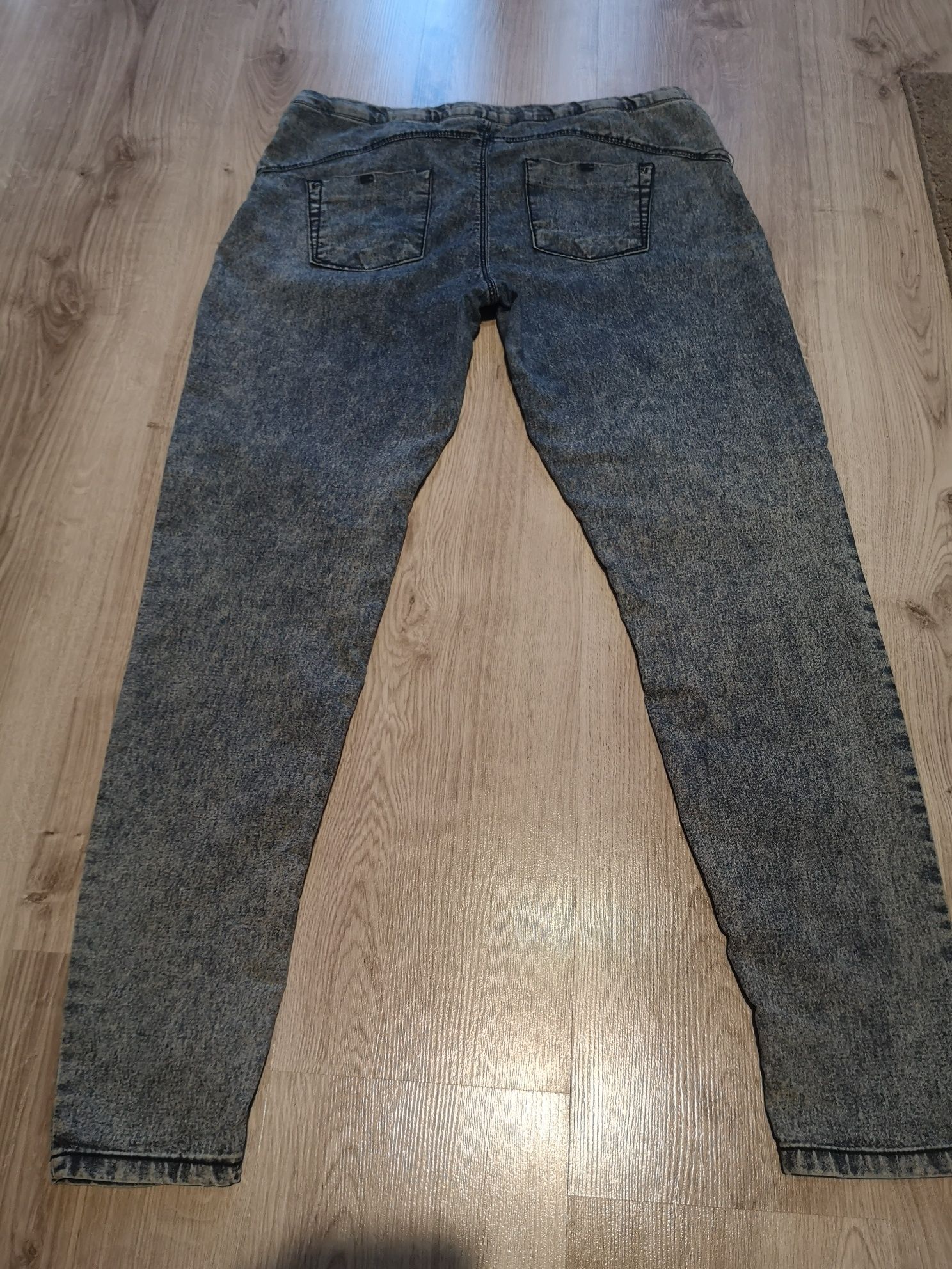 Spodnie jeansy marmurkowe 38 M