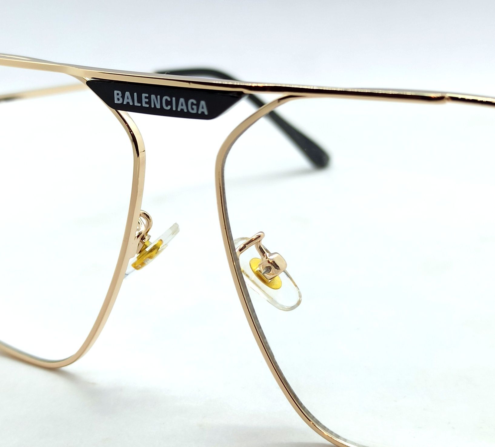 Balenciaga очки женские модные имиджевые в золотом и черном металле