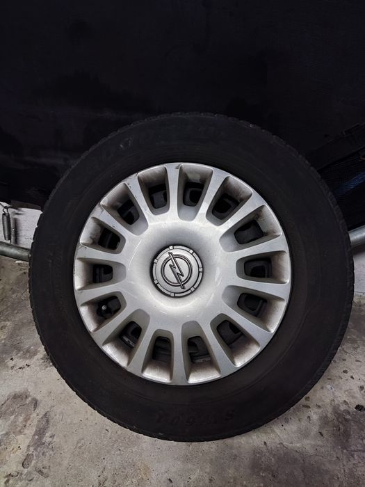 Koła felgi stalowe kołpaki opony Opel 4 sztuki