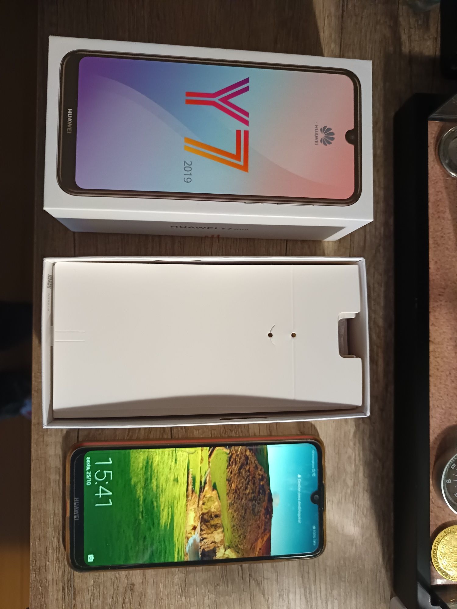 Vendo telemóvel huawei y7 2019 vai com relógio eletrónico marca é mi