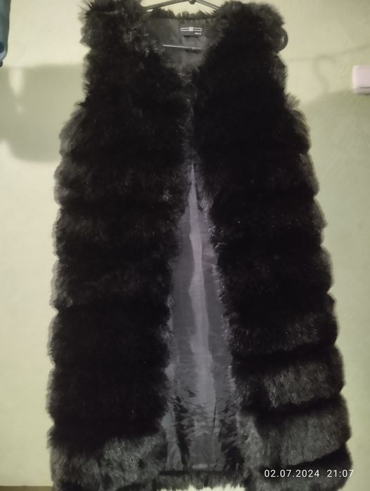 Продам жилетку меховую