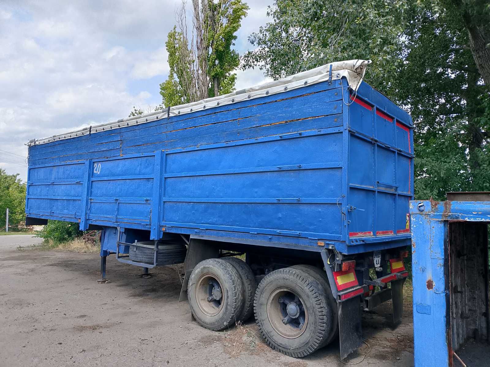 Полуприцеп Камаз бортовой зерновоз