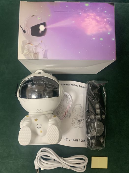 Лазерний нічник проектор зоряного неба «Астронавт»  Космонавт СИДИТ